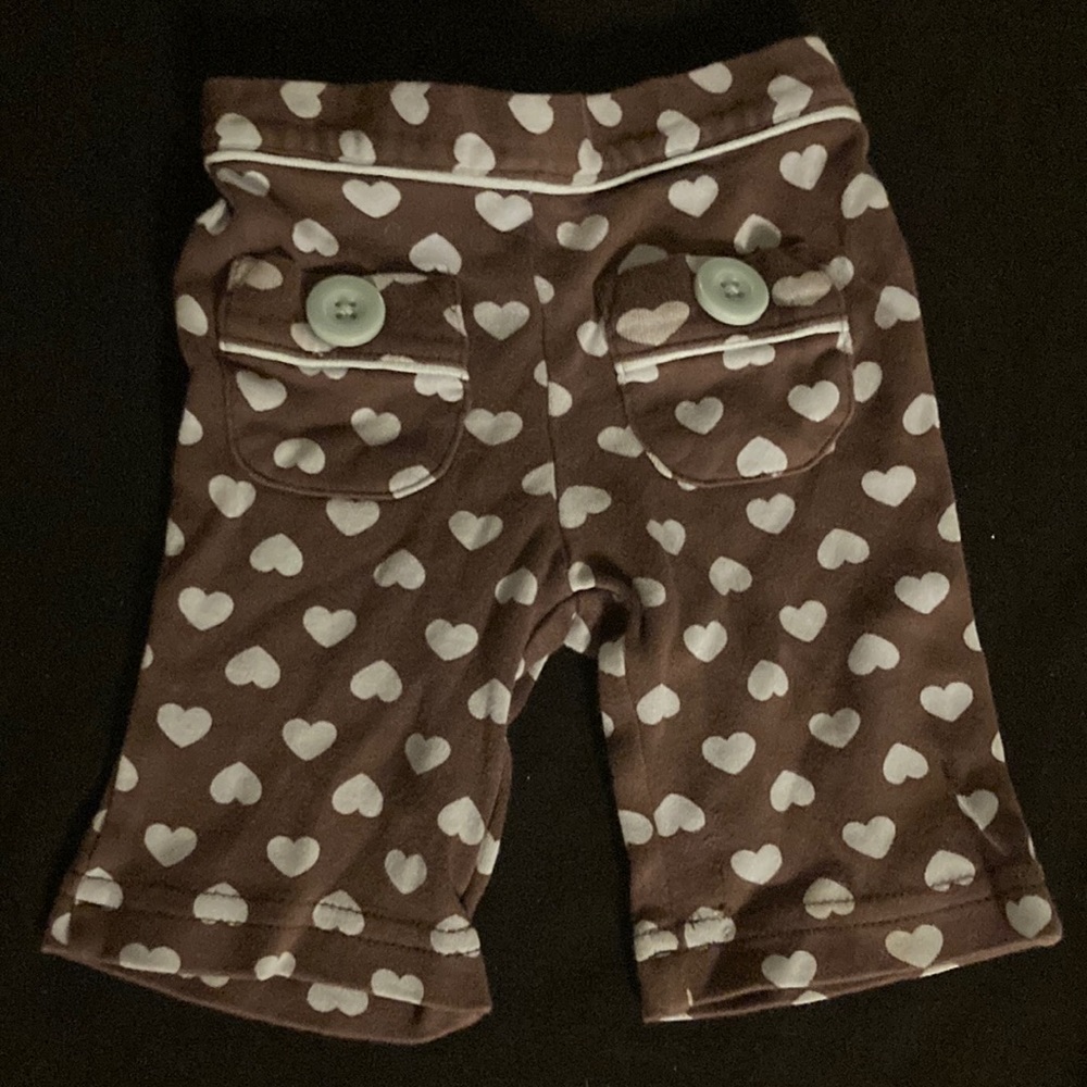 Brown pants with blue hearts and cute pockets with buttons